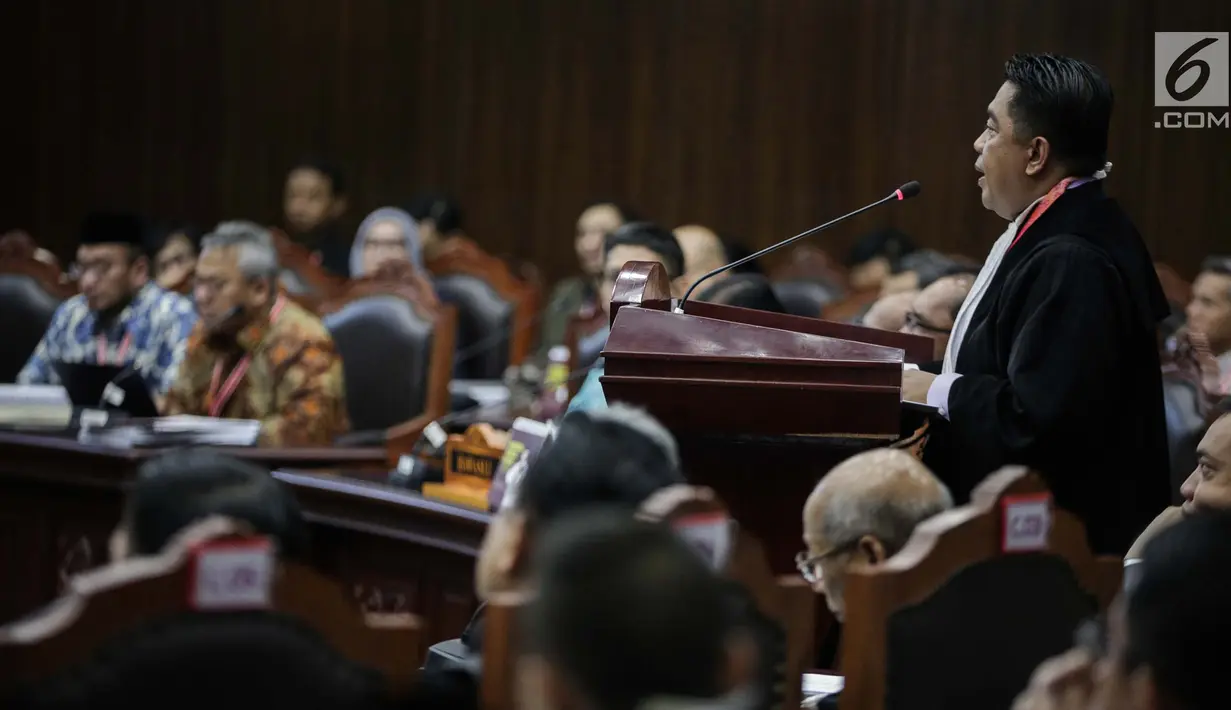 Ketua Kuasa Hukum KPU untuk Pilpres, Ali Nurdin memberikan keterangan dalam sidang sengketa Pilpres 2019 di Gedung MK, Jakarta, Selasa (18/6/2019). Sidang tersebut beragendakan mendengarkan jawaban dari termohon. (Liputan6.com/Faizal Fanani)