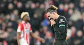 Rentetan kemenangan Liverpool di Liga Champions 2024/2025 akhirnya terhenti di markas PSV Eindhoven pada Matchday kedelapan Liga Champions di Phillips Stadium, Kamis (30/1/2025) dini hari WIB. (AFP/Nicolas Tucat)