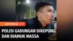 Seorang pria yang diduga polisi gadungan dikepung dan diamuk warga di Depok, Jawa Barat. Sebelumnya pria tersebut terlihat warga tengah mengintimidasi seorang pria dengan memborgol tangannya.
