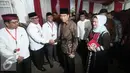 Presiden Joko Widodo (Jokowi) ditemani Ibu Negara Iriana Widodo menghadiri peringatan tahunan wafatnya (haul) mantan Ketua MPR Taufiq Kiemas di kediaman Jalan Teuku Umar, Jakarta, Rabu (8/6/2016). (Liputan6.com/Faizal Fanani)