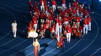 Defile kontingen Indonesia pada upacara pembukaan ASEAN Para Games 2023 di Stadion Morodk Techo. Phnom Penh, Kamboja berlangsung semarak dan meriah, Sabtu (3/6/2023) malam WIB. (Bola.com/Dok NPC Indonesia)
