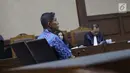Terdakwa dugaan suap PT Krakatau Steel, Kurniawan Eddy Tjokro saat menjalani sidang pembacaan vonis di Pengadilan Tipikor, Jakarta, Kamis (15/8/2019). Direktur PT Tjokro Bersaudara tersebut divonis 1 tahun 3 bulan penjara dan denda sebesar Rp 100 juta. (Liputan6.com/Helmi Fithriansyah)