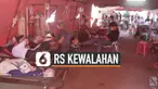 Dengan kembali meningkatnya penularan COVID-19 hinga sempat mencapai 20,000 kasus perhari, banyak rumah sakit di Indonesia kebanjiran pasien, seperti RSUD Kota Bekasi, Jawa Barat ini, sehingga harus membangun tenda-tenda darurat .