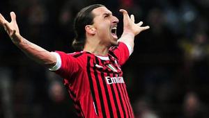 Selebrasi striker AC Milan Zlatan Ibrahimovic sesuai mencetak gol penutup kemenangan 4-0 dari Arsenal pada leg pertama 16 besar Liga Champions di San Siro, Milan, 15 Februari 2012. AFP PHOTO/GIUSEPPE CACACE