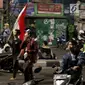 Massa berkumpul saat terjadi ricuh akibat unjuk rasa di sekitar jalan Pejompongan, Jakarta, Rabu (25/9/2019). Sebelumnya, unjuk rasa yang dilakukan pelajar STM bentrok dengan aparat kepolisian dibelakang Gedung DPR/MPR. (Liputan6.com/Helmi Fithriansyah)