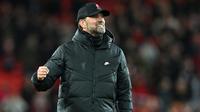 Jurgen Klopp - Juru taktik asal Jerman ini merupakan satu di antara pelatih yang menerapkan strategi gegenpresing. Pola permainan yang dikembangkan oleh Ralf Rangnick itu terbukti sukses membawa Liverpool merajai Inggris dan Eropa. (AFP/Paul Ellis)