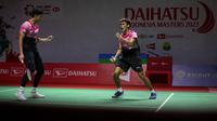 Pebulutangkis ganda putra Indonesia, Muhammad Shohibul Fikri/Bagas Maulana melakukan selebrasi setelah mencetak poin saat bertanding melawan pebulutangkis ganda putra China, Ren Xiang Yu/Tan Qiang pada laga 16 besar Indonesia Masters 2023 di Istora Senayan, Jakarta, Kamis (26/01/2023). Muhammad Shohibul Fikri/Bagas Maulana menang dua game langsung 21-14, 21-14. (Bola.com/Bagaskara Lazuardi)