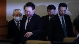 Pada sidang ini, Yoon Suk Yeol berpeluang menyampaikan argumennya atau menjawab pertanyaan terkait upayanya memberlakukan darurat militer yang kemudian dibatalkan. (Kim Hong-Ji/POOL/AFP)