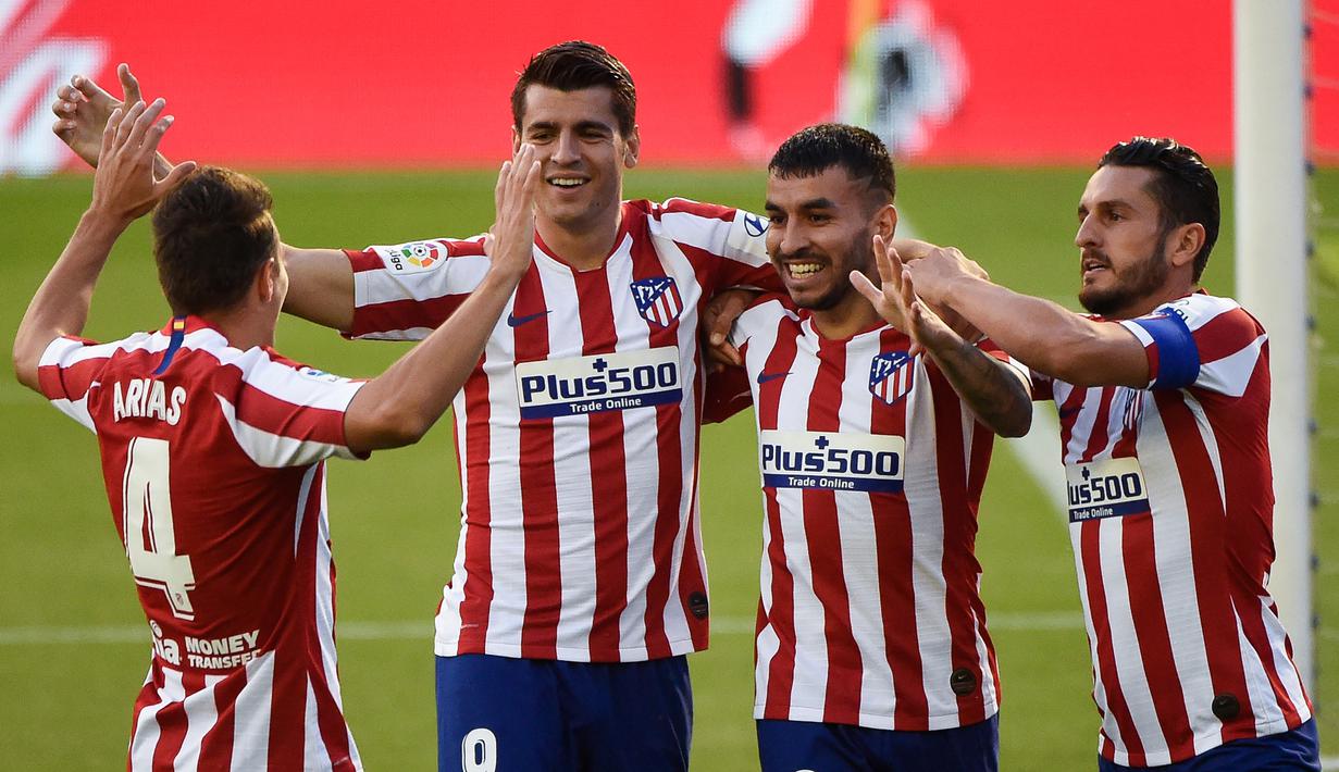 Pemain Atletico Madrid merayakan gol yang dicetak Alvaro Morata ke gawang Celta Vigo pada laga lanjutan La Liga di Abanca-Balaidos, Rabu (8/7/2020) dini hari WIB. Atletico Madrid ditahan imbang 1-1 oleh Celta Vigo. (AFP/Miguel Riopa)