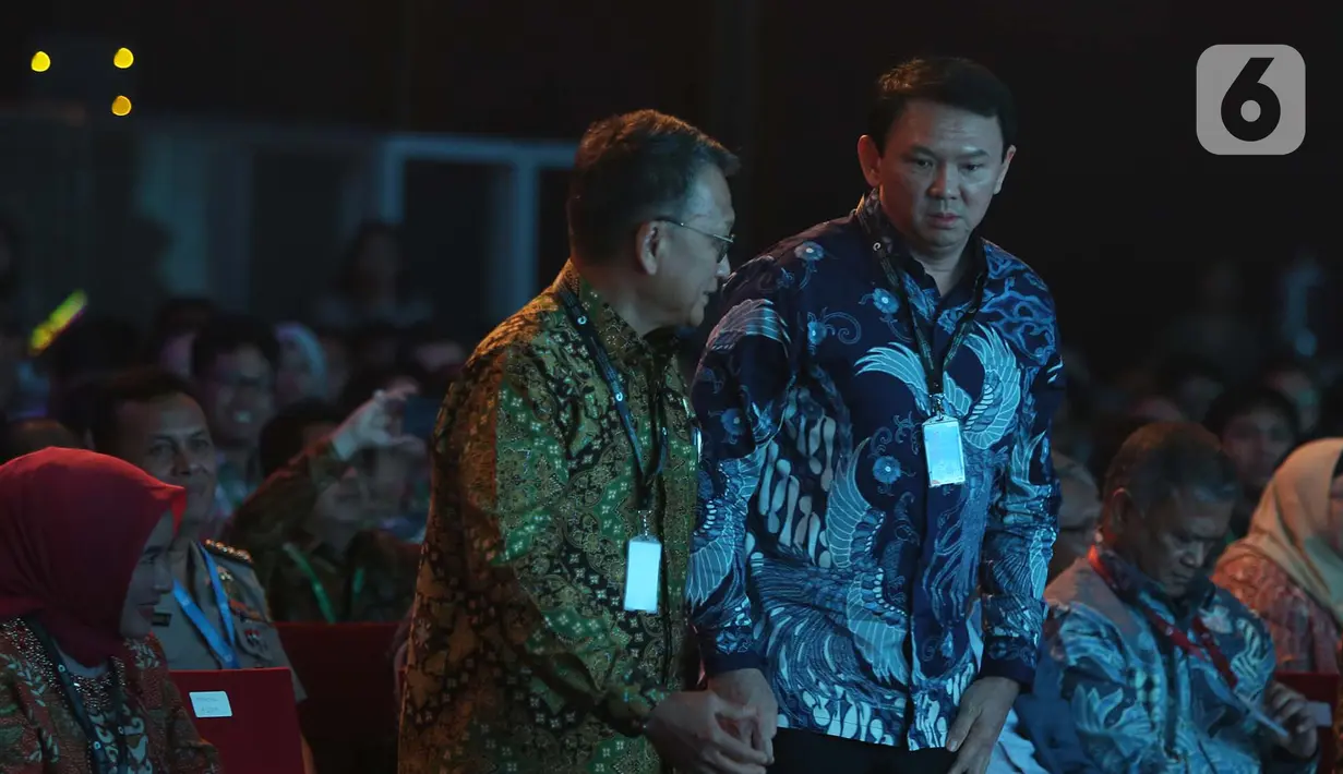 Menteri ESDM Arifin Tasrif dan Komisaris Utama Pertamina Basuki Tjahaja Purnama menghadiri pembukaan Pertamina Energy Forum 2019 di Jakarta, Selasa (26/11/2019). Kehadiran Basuki yang biasa disapa Ahok tersebut menjadi perhatian dalam pembukaan acara tersebut. (merdeka.com/Imam Buhori)