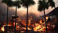 Sedikitnya lima orang tewas dalam kebakaran hutan hebat yang menghanguskan sejumlah kawasan di sekitar Los Angeles, kata para pejabat pada 8 Januari 2025.  (AGUSTIN PAULLIER/AFP)