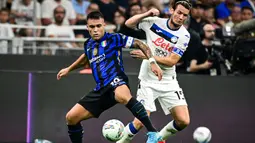 I Nerazzurri mendominasi pertandingan sejak menit awal dan unggul pada menit ke-7 setelah pemain Atalanta, Berat Djimsiti melakukan kesalahan yang berujung pada gol bunuh diri. (Piero CRUCIATTI/AFP)