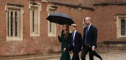 Kate Middleton antar Pangeran George masuk hari pertama sekolah dengan tampilan yang anggun (Photo by Adrian DENNIS / POOL / AFP)