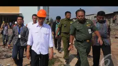 Gubernur DKI Jakarta Joko Widodo (Jokowi) blusukan ke Rusun di Kawasan Muara Baru, Jakarta Utara, Senin (4/8/2014) (Liputan6.com/Herman Zakharia)