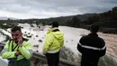 Banjir bandang menyapu puluhan mobil warga dan mengganggu layanan kereta api di sebagian besar wilayah timur dan selatan Spanyol. (AP Photo/Gregorio Marrero)