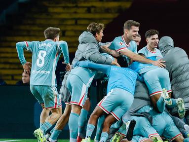 Atletico Madrid sukses meraup poin penuh kala bertandang ke markas Barcelona pada jornada ke-18 La Liga 2024/2025 hari Minggu (22/12/2024) dini hari WIB. (AP Photo/Joan Monfort)