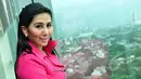 Penyanyi Ratna Dilla saat berkunjung ke redaksi Liputan6.com, SCTV Tower, Jakarta, Senin (23/2/2015). (Liputan6.com/Panji Diksana)