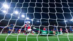 Arsenal berhasil memastikan tempat di final Liga Champions 2025/2026 setelah mengalahkan Atletico Madrid dengan skor tipis 1-0 pada leg kedua semifinal yang digelar di Emirates Stadium, London, Rabu (6/5/2026) dini hari WIB. (AFP/Adrian Dennis)
