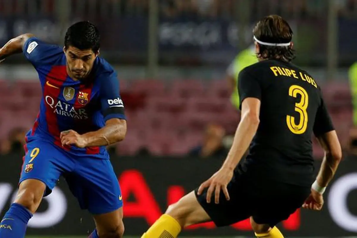 Luis Suarez dan Felipe Luis