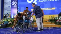 Bantuan kursi roda dari TASPEN untuk para peserta. (Foto: Istimewa)