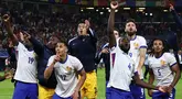 Pemain timnas Prancis melakukan selebrasi usai memenangi laga perempat final Euro 2024 melawan Portugal di Volksparkstadion, Hamburg, Jumat 5 Juli 2024 atau Sabtu 6 Juli 2024 dini hari WIB. (FRANCK FIFE/AFP)