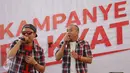 Grup hip hop Sweet Martabak saat meramaikan kampanye rakyat di Rumah Lembang, Jakarta, Senin (28/11). Musisi dan artis turut meramaikan di antaranya NEO, Gading Marten, Tompi, Happy Salma, Cathy Sharon, dan J-Flow. (Liputan6.com/Immanuel Antonius)