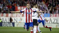 Penyerang Atletico Madrid Koke merayakan gol ke gawang Valencia ( AFP PHOTO/ DANI POZO)