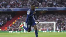 Pemain Paris Saint-Germain (PSG), Ousmane Dembele, merayakan gol yang dicetaknya ke gawang Arsenal dalam leg pertama semifinal Liga Champions di Emirates Stadium, Rabu (30/4/2025) dini hari WIB. (Adam Davy/PA via AP)