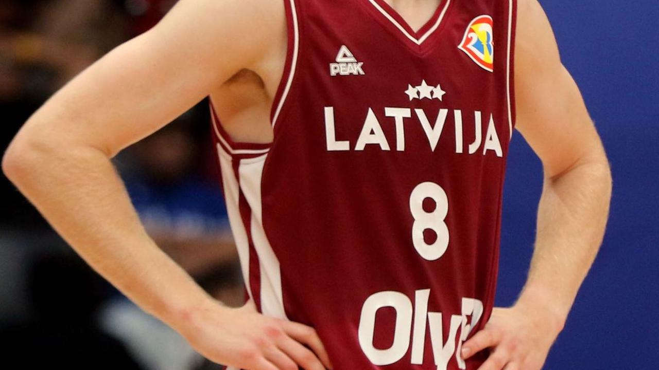 Wajah lesu pemain Latvia setelah ditekuk Kanada.