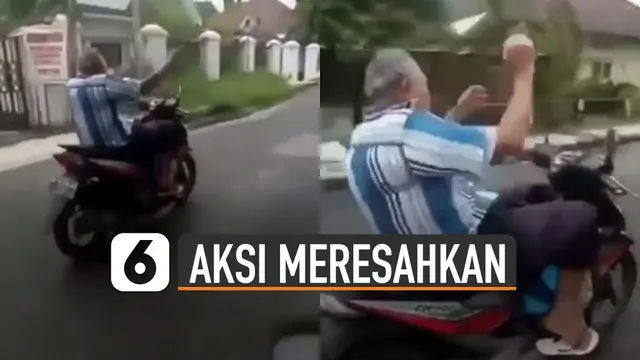 Aksi pria paruh baya mengendarai motor dengan lepas tangan beredar di media sosial. Hal itu bisa membahayakan pengendara lain dan dirinya sendiri.
