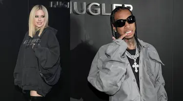 Foto kolase Avril Lavigne dan Tyga saat menghadiri Mugler x Hunter Schafer Party selama acara Paris Fashion Week di Prancis pada Selasa, 7 Maret 2023. Tyga dan Avril melawati banyak kerumunan dengan saling bergandengan tangan. Tampak Tyga mengenakan kemeja dan celana abu-abu dengan kalung-kalung silver besar. Sementara Avril mengenakan hoodie oversized dan boots tinggi ala Ariana Grande. (Scott Garfitt/Invision/AP)