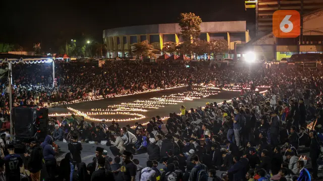 Foto: Gelar Doa Bersama, Ribuan Masyarakat Penuhi Stadion Kanjuruhan