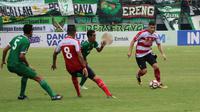 Gelandang Madura United, Nuriddin Davronov. (Bola.com/Aditya Wany)