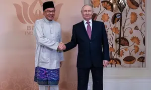 Perdana Menteri Malaysia Anwar Ibrahim dan Presiden Rusia Vladimir Putin bertemu di New Delhi, India, Jumat (11/9/2026), jelang KTT BRICS. (Dok. Instagram/@anwaribrahim_my)