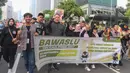 Sosialisasi mengajak masyarakat untuk tetap ikut memilih dan tidak golput. (merdeka.com/Arie Basuki)