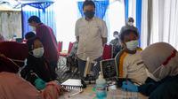 Peruri bekerja sama dengan Puskesmas Telukjambe menggelar program vaksinasi gratis (Dok: Peruri)