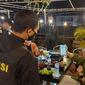 Aparat Polresta Manado menggelar Operasi Yustisi pencegahan penyebaran Covid-19.