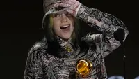 Billie Eilish dalam Grammy Awards 2021. (AP Photo/Chris Pizzello)