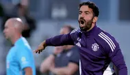Pelatih&nbsp;Manchester United Ruben Amorim bereaksi di pinggir lapangan saat pertandingan putaran kedua Piala Liga Inggris melawan Grimsby Town, Kamis (28-8-2025) dini hari WIB, di Hill Blundell Park, Grimsby, Inggris. (Nigel French/PA via AP)