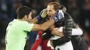 Pelatih Paris Saint Germain (PSG), Thomas Tuchel,  melakukan selebrasi usai menaklukkan Liverpool pada laga Liga Champions di Stadion Parc des Princes, Paris, Rabu (28/11). PSG menang 2-1. (AP/Thibault Camus)