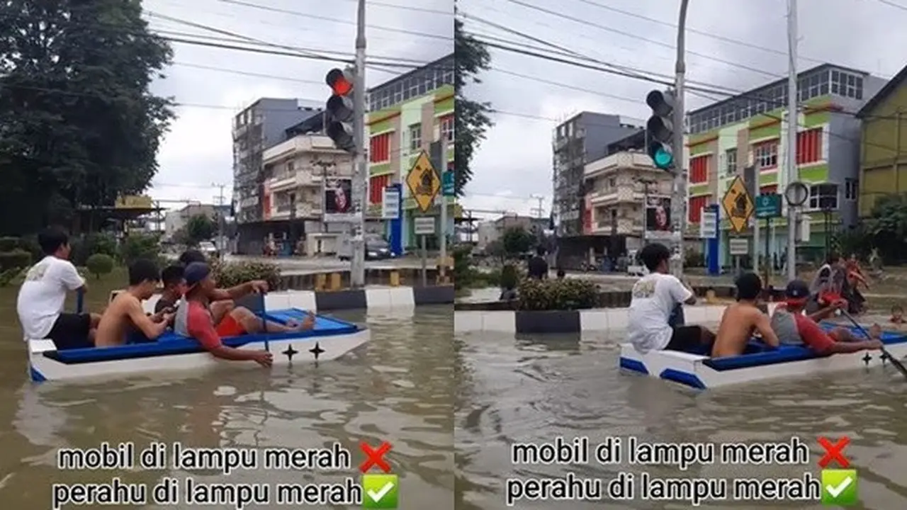 Viral Aksi Pemuda Naik Perahu Berhenti di Lampu Merah saat Banjir