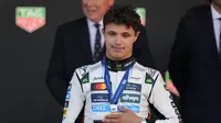 Pembalap McLaren F1 Team, Lando Norris, berhasil meraih podium juara Formula 1 GP Monaco di&nbsp;Circuit de Monaco, Minggu (25/5/2025) malam WIB. (AP Photo/Manu Fernandez)
