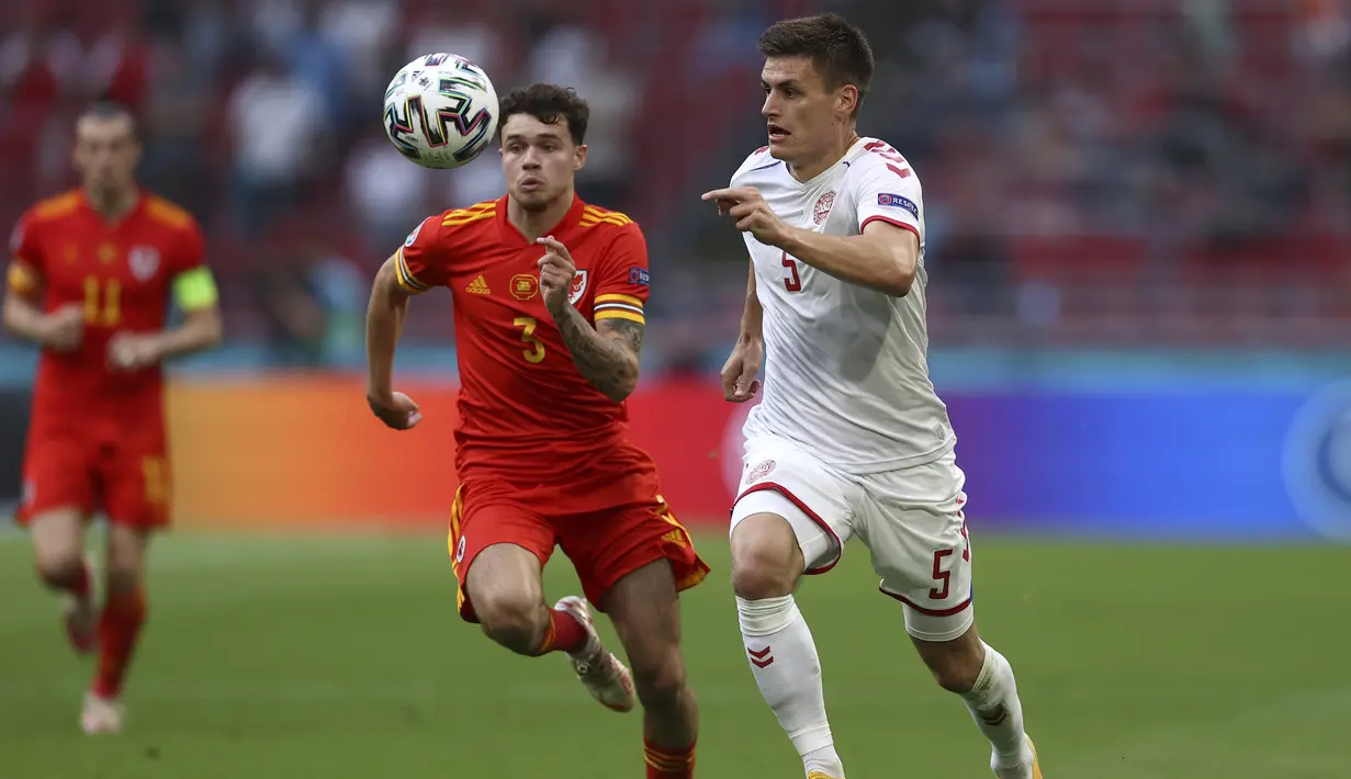 Di masa injury time babak pertama, Denmark kembali memperoleh peluang. Tembakan dari bek Joakim Maehle dari sisi kanan masih mampu dimentahkan kiper Danny Ward. (Foto: AP/Pool/Dean Mouhtaropoulos)