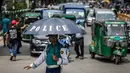 Pengakhiran aksi mogok kerja menyusul pertemuan kepolisian dengan pemerintah sementara Bangladesh. (LUIS TATO/AFP)