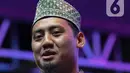 Muhammad Abi Azkakia atau biasa disebut Ustaz Abi yang merupakan seorang da'i yang berdakwah sembari bermain Mobile Legends. (Liputan6.com/Herman Zakharia)