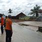 1.451 unit rumah yang berada di 13 desa dan 3 kecamatan terendam banjir dengan tinggi muka air berkisar antara 30-80 sentimeter di Kabupaten Batubara, Sumatera Utara (Sumut) (BNPB Indonesia)