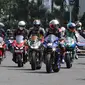 Parade pembalap MotoGP di kawasan Bundaran HI, Jakarta, Rabu (16/3/2022). Sebanyak 20 pembalap ikut ambil bagian. Sebagian besar merupakan rider yang akan tampil pada MotoGP Mandalika, 18-20 Maret 2022. (Liputan6.com/Herman Zakharia)