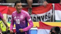 Winger Jerman Jamal Musiala merayakan gol ke gawang Hungaria pada laga grup A Euro 2024 (AP)