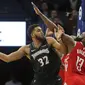 Karl Anthony Towns (32) memimpin Timberwolves mengalahkan Rockets di lanjutan NBA (AP)