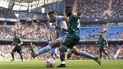 Satu gol City lainnya dilesakkan oleh Rodri. Adapun Watford cuma bisa membalas melalui Hassane Kamara. (AP/Jon Super)